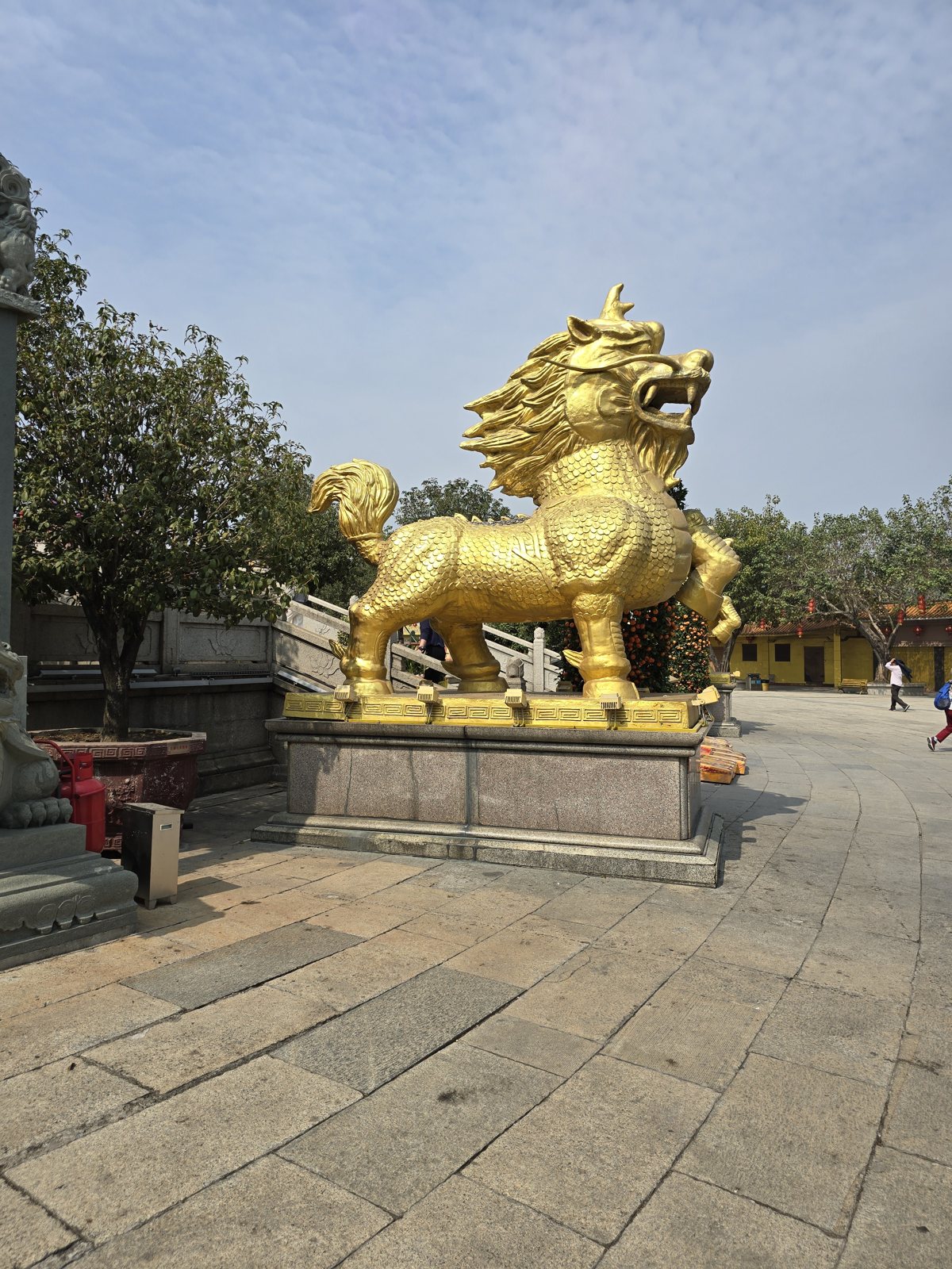 A golden qilin at a temple