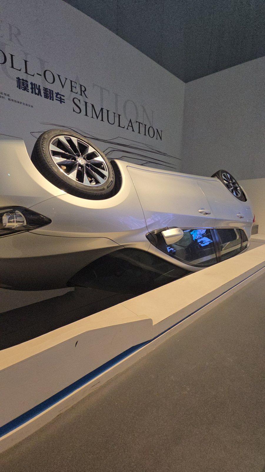Car rollover simulator at an exhibition