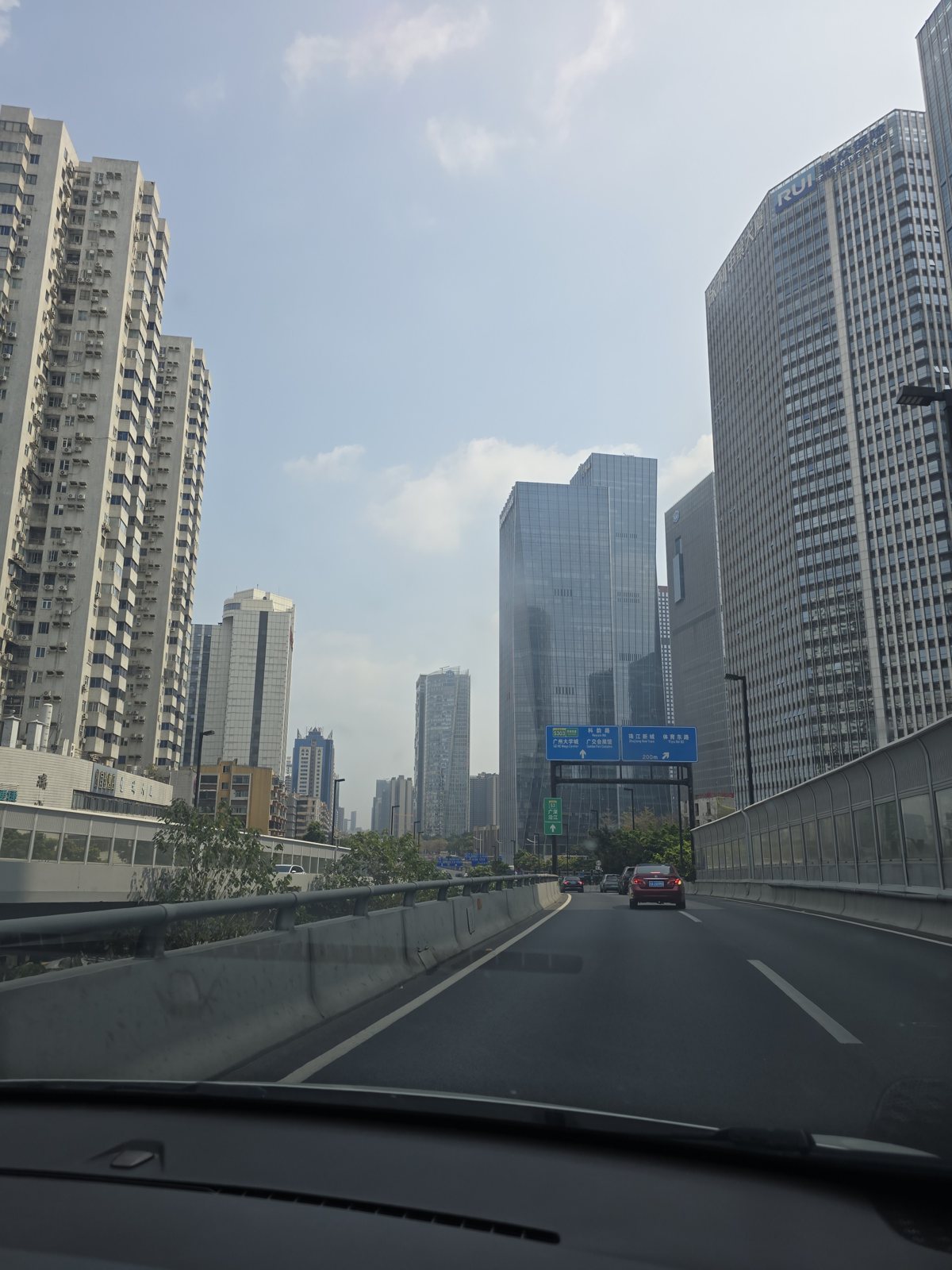 A road between high-rises
