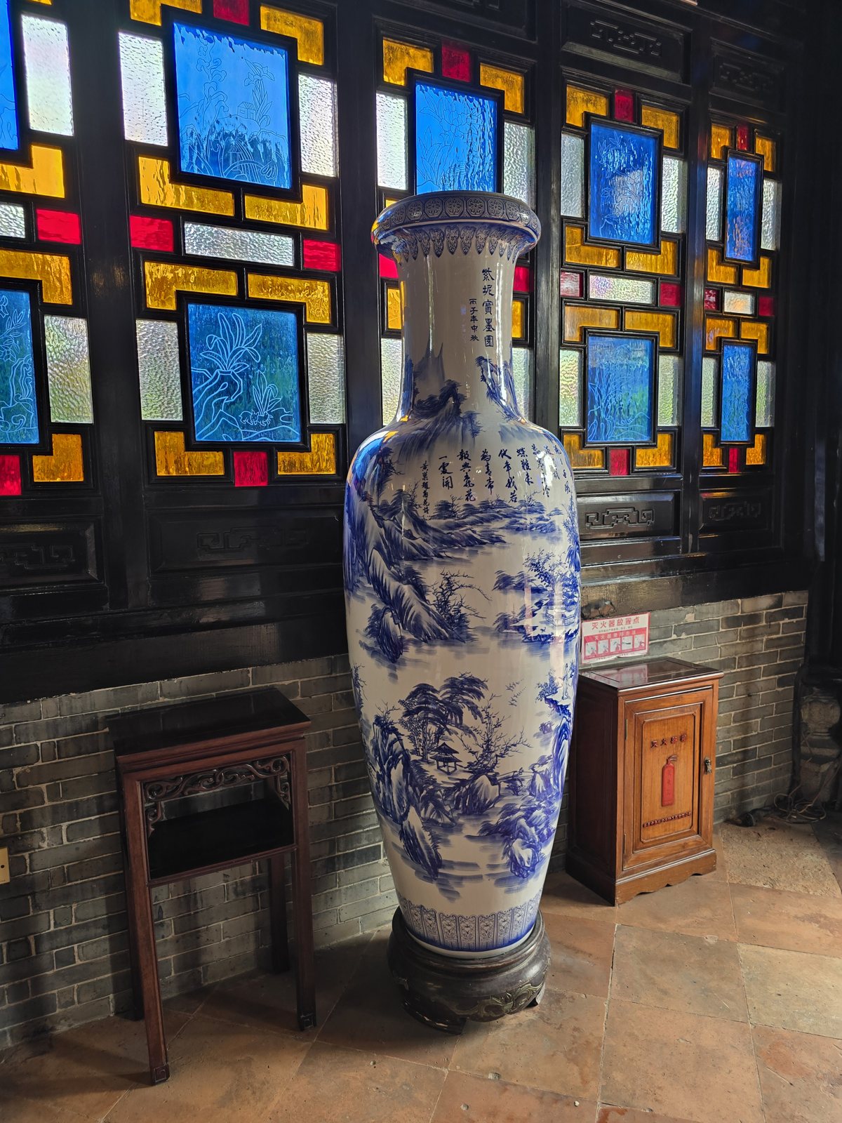 An old vase and stained-glass windows